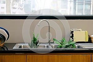 Interior of modern kitchen with sink