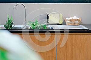 Interior of modern kitchen with sink