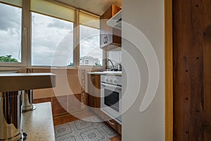 Interior of the modern luxure kitchen  in studio apartments in minimalistic style