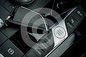 Interior of a modern luxury gray black car, auto detail,key