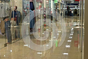 Interior of a modern shop with glass floors and walls photo