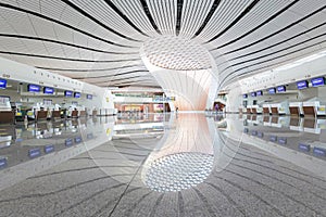 Interior of modern terminal building with grid skylight