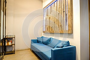 interior of modern waiting room with blue sofa