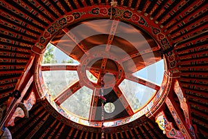 Interior of a mongolian yurt. Detail of the roof window. photo
