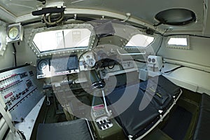 Interior of a new armoured personnel carrier seats, wheel, dashboard