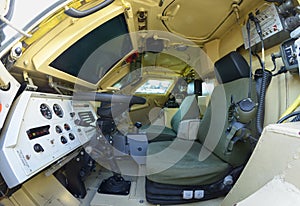 Interior of a new armoured personnel carrier seats, wheel, dashboard