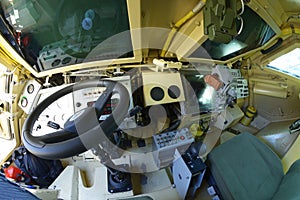 Interior of a new armoured personnel carrier seats, wheel, dashboard