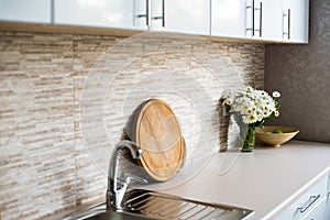 Interior of new bright white home kitchen