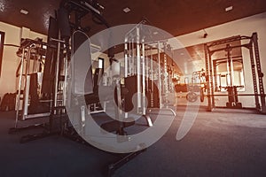 Interior of new modern gym with equipment