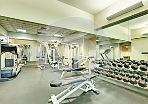 Interior of new modern gym with sport equipment