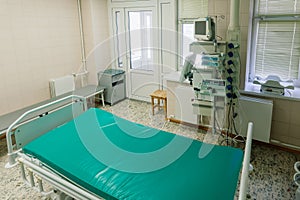 Interior of new operating room with equipment in modern clinic