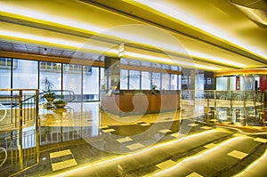 Interior of an office building lobby with reception