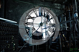 Interior of old big clock face tower mechanism
