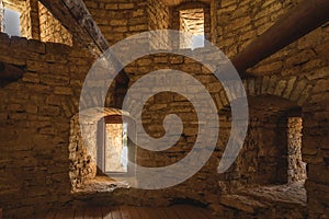 Interior of the old fortress tower. The window embrasures, thick walls.