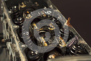 Interior of an old worn internal combustion engine. Nagar, black deposits inside the engine, pushers.