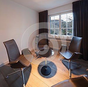 Interior, oom with leather chairs