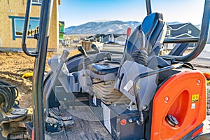 Interior of the open cab of a heavy duty construction machinery