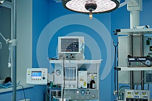 Interior of an operating room in a modern clinic. Plastic surgery, life saving, medicine