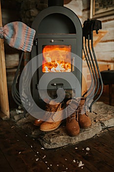 Interior photo of a mountainhouse fireplace. Cozy fireplace
