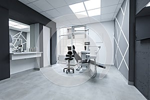 Interior photo of stomatology clinic with concrete elements