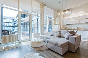 Interior photography luxury kitchen studio in loft style room in white, with kitchen furniture luxury