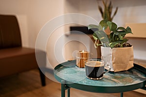 Interior photography of modern style open plan lounge room, details of brown sofa