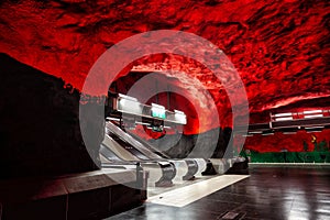 Interior of the Radhuset metro station (Tunnelbana) with an escalator in Stockholm, Sweden