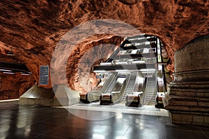 Interior of the Radhuset metro station (Tunnelbana) with an escalator in Stockholm, Sweden photo