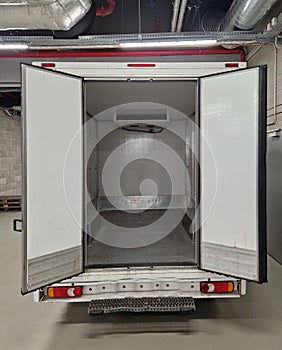 interior refrigerated truck is insulated and hygienically white for transporting