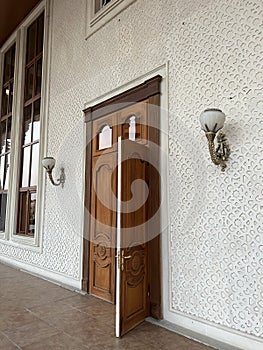 Interior of a room with arabic pattern and wooden doors