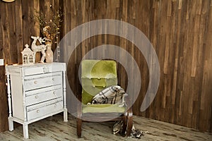 Interior room with chest of drawers and an old chair