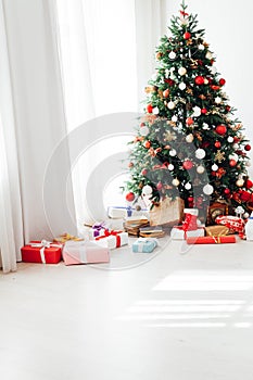 Interior room with Christmas tree window with new year gifts