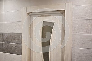 The interior of a room installed with a new interior. door.The installed door harmoniously complements the interior of the room, b