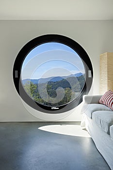 Interior, room with large porthole