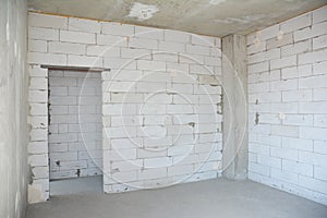 Interior room under construction. Wall without plasterwork.