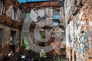 Interior of ruined, abandoned apartment residential building after earthquake or war