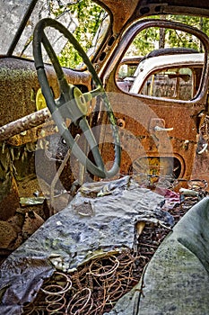 Interior of rusty old truck front seat