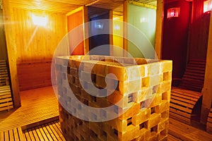 Interior of the salt sauna room with a stack of Himalayan rock salt