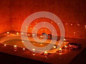 Interior of sauna with candle.