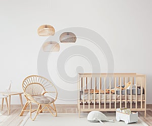 Interior of Scandinavian baby room with comfortable crib and rattan armchair in nursery decor