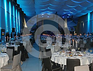 The interior of the sideboard in marine style. large ceremonial Banquet hall in a nautical style in blue lights.