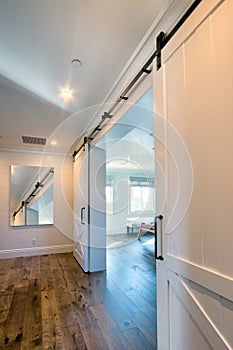 Interior sliding barn doors into bathroom