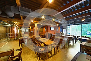 Interior of small cafe-bar with wooden