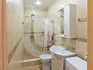 Interior of small combined bathroom