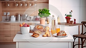 Interior of small white kitchen with fresh fruit, two glasses of orange juice, baguette, red caviar, croissant and cookies with