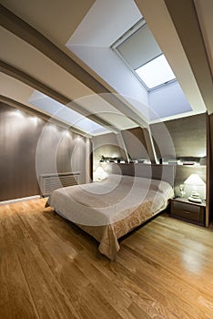 Interior of a specious luxury bedroom in the loft