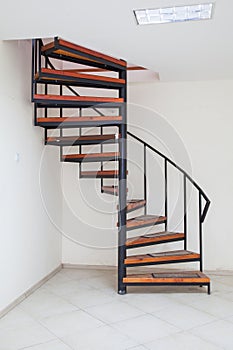 Interior. Spiral staircases at modern home or office. Vertical view