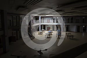 Interior of state prison with light in common area