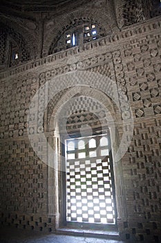 The interior of the stone mausoleum of the Samanids in Bukhara, Uzbekistan. Tourism, travel concept