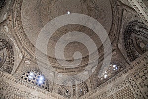 The interior of the stone mausoleum of the Samanids in Bukhara, Uzbekistan. Tourism, travel concept